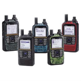 an assortment of handheld icom ham radio HTs