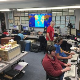 ham radio operators in a large contesting station