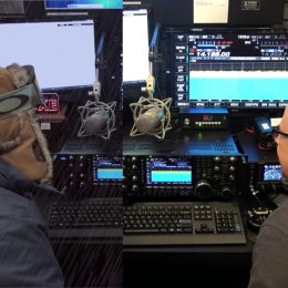 two men at a ham radio station