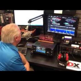 a man working at a ham radio station