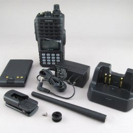 a handheld ham radio and charger