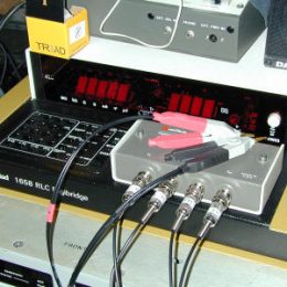 ham radio test equipment on workbench