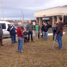 a group of ham radio operators talking outside