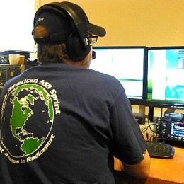 ham radio operator at home station