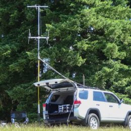 ham radio antenna set up from the back of an SUV