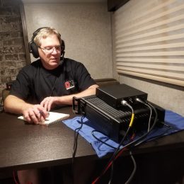ham radio operator working at indoor station