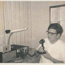 vintage photograph of a man at a ham radio station