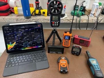 Weather radio and equipment at a Concerts in the Park event