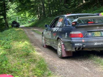 Cars racing in Southern Ohio Forest Rally