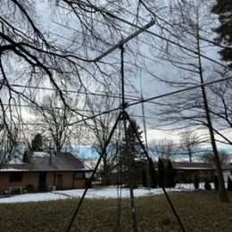 a ham radio antenna set up on an outdoor tripod