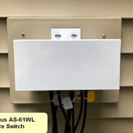 hamplus remote switch, mounted to side of house