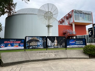 outside of a nasa space camp visitors center