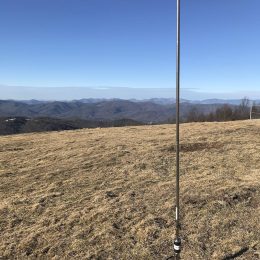 portable ham radio antenna set up over mountain range