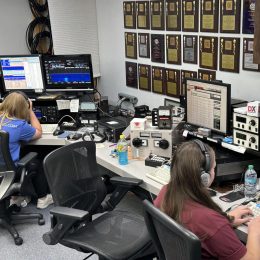 young ham radio operator at a station