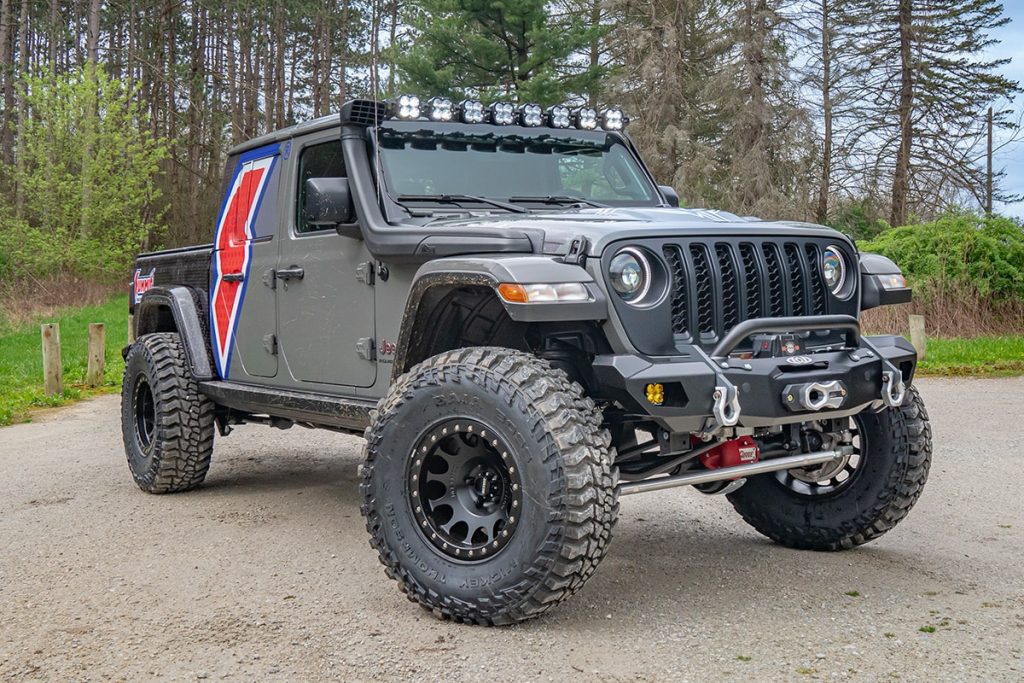 Customized Jeep Gladiator Truck in gravel lot
