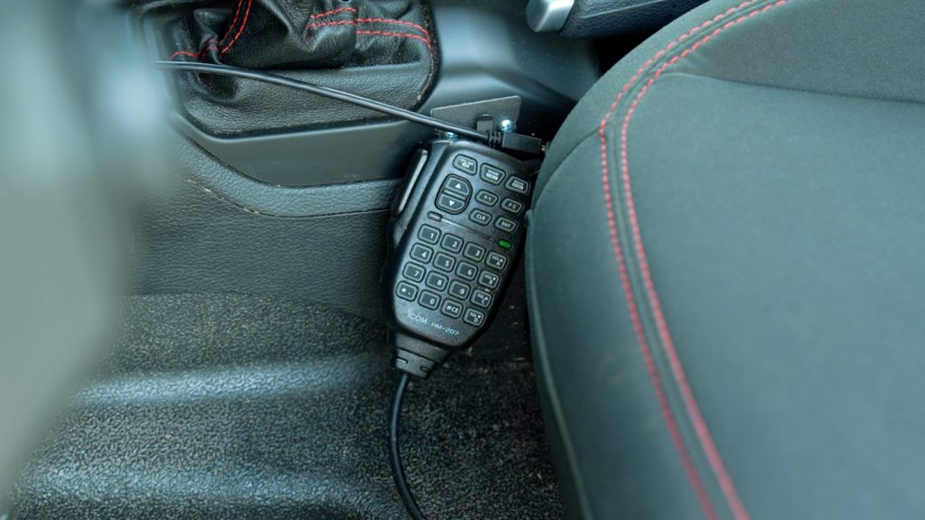 close up of a radio control mic mounted in a vehicle