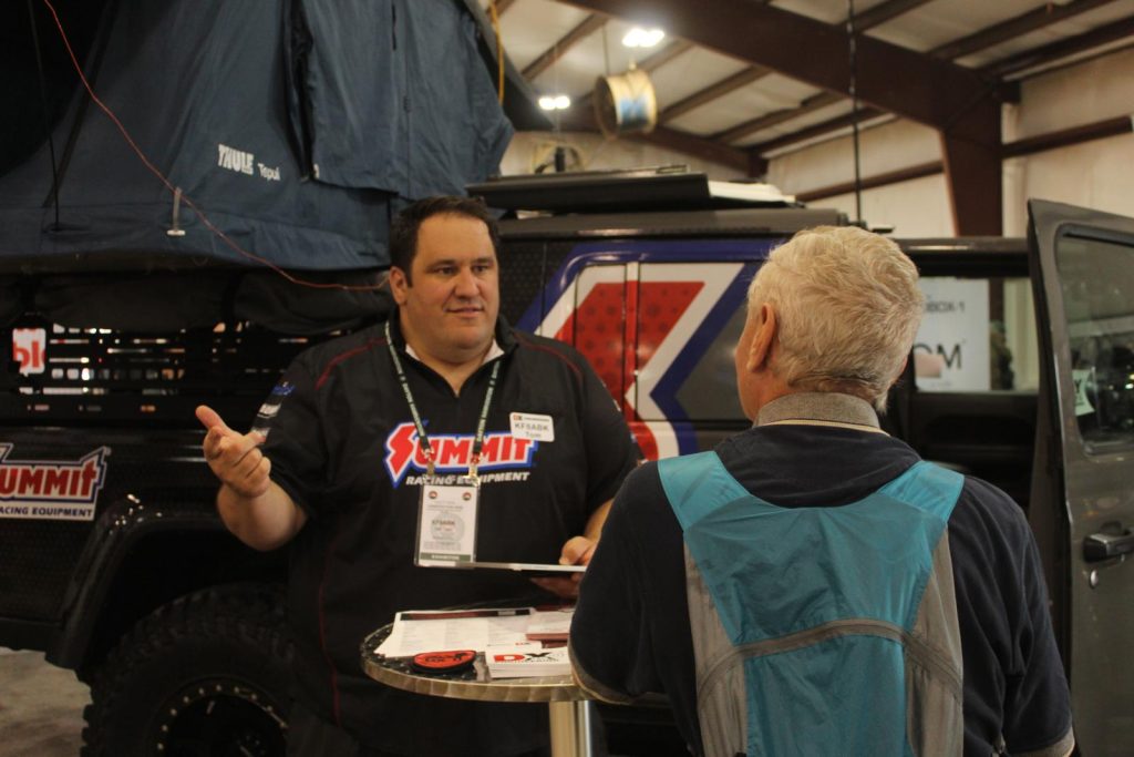man talking with attendee at hamvention