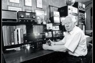 vintage photo of a man at a ham radio desk