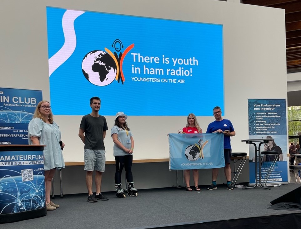 Young ham radio operators on a presentation stage