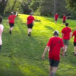 a group of young ham operators engaged in a fox hunt