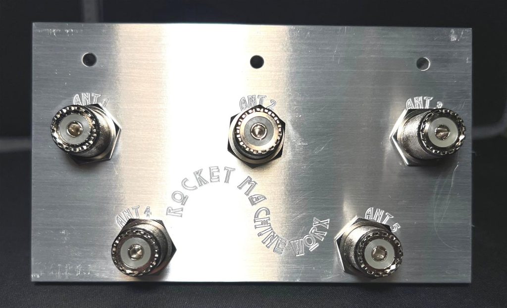 metal bulkhead with radio connectors in place