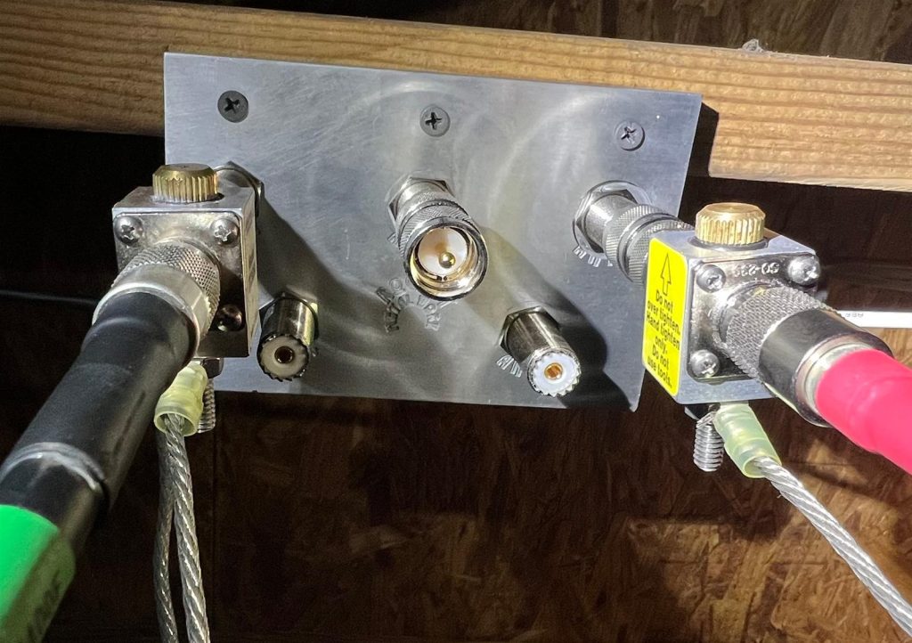 metal bulkhead with RF connectors installed