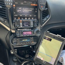 ham radios installed in a vehicle dash