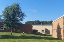 ham radio tower standing above school