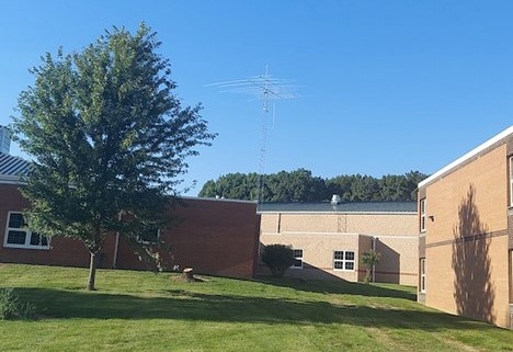 ham radio tower standing above school