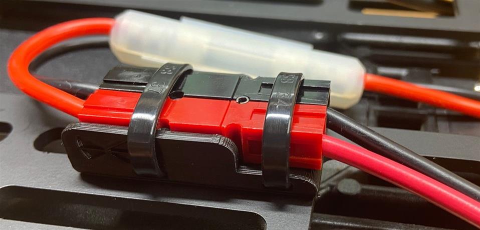close up of a powerpole connector in bracket