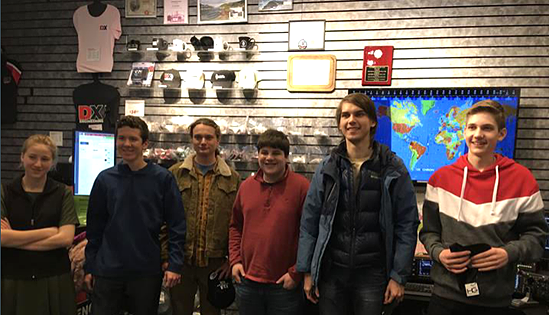 group of young ham operators in dx engineering showroom