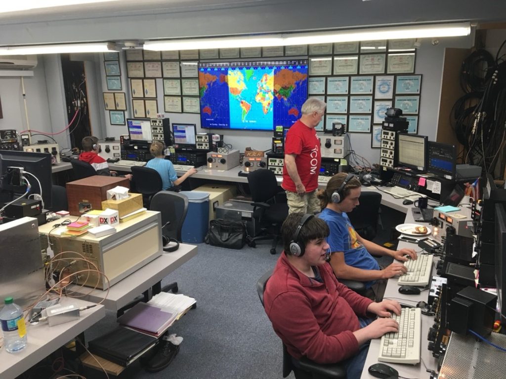 young ham operators in a contest station