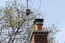 small loop antenna erected on roof