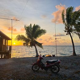 scooter parked on seaside beach