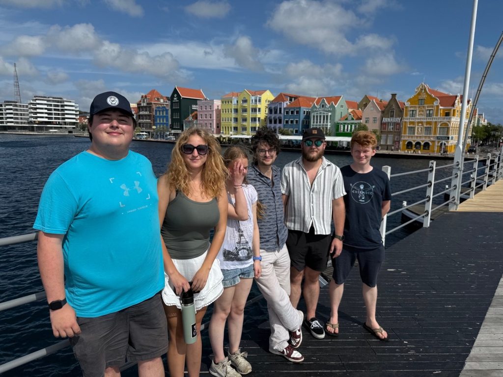 young people on a seaside pier