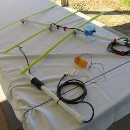 Homemade ham radio antennas on a table