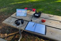 portable ham radio station on a park bench